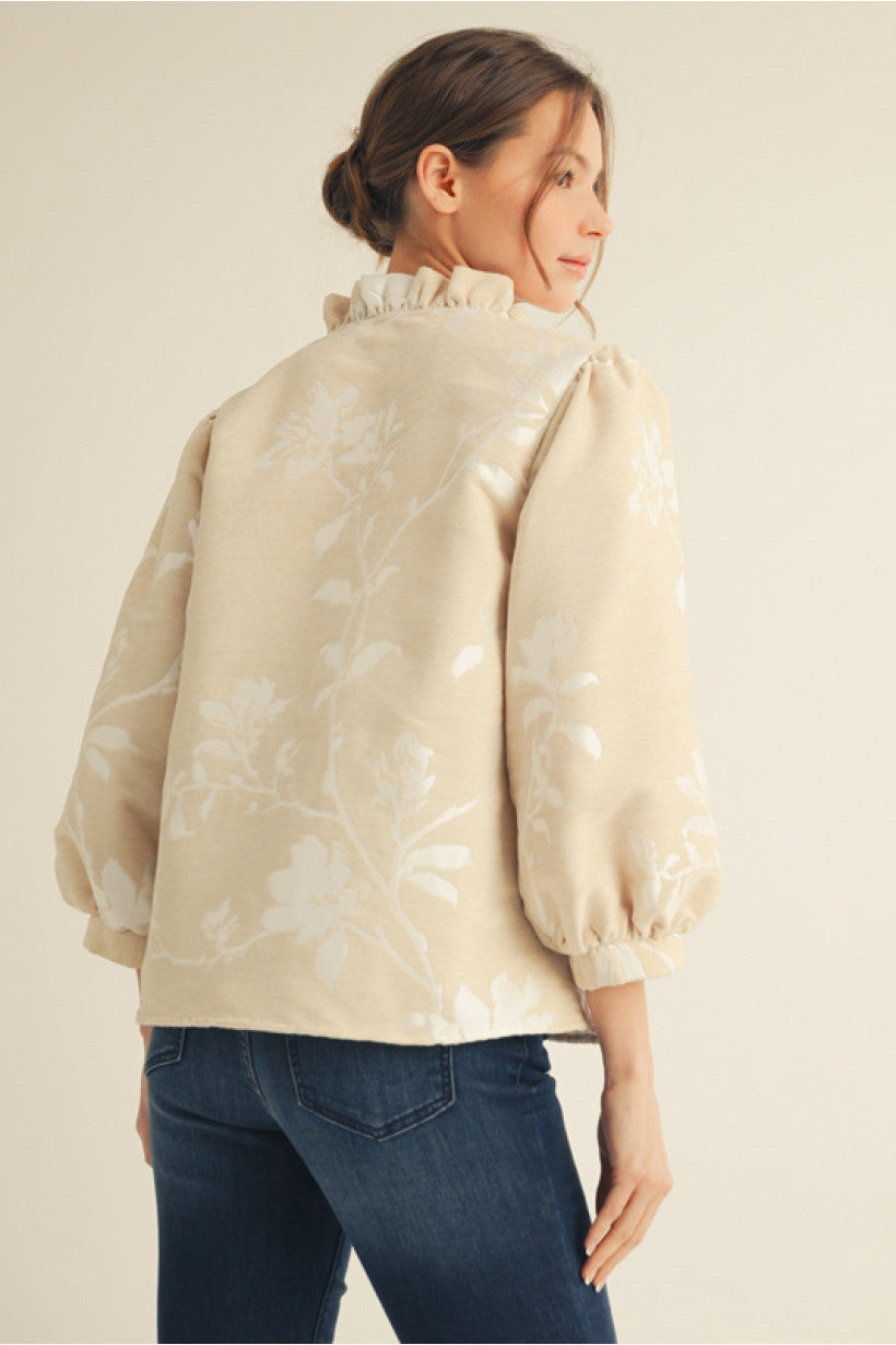 Cream 3/4 sleeves button down floral jacquard top, ruffled mock neckline.