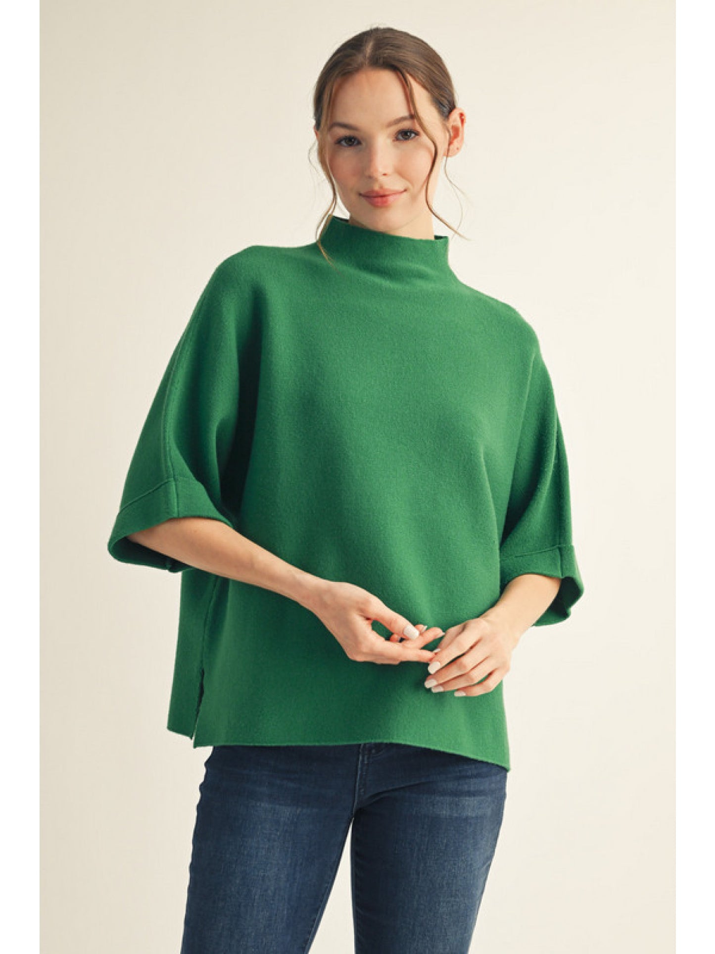 Hunter Green Drop shoulder mock neck soft sweater top with side slit detail.