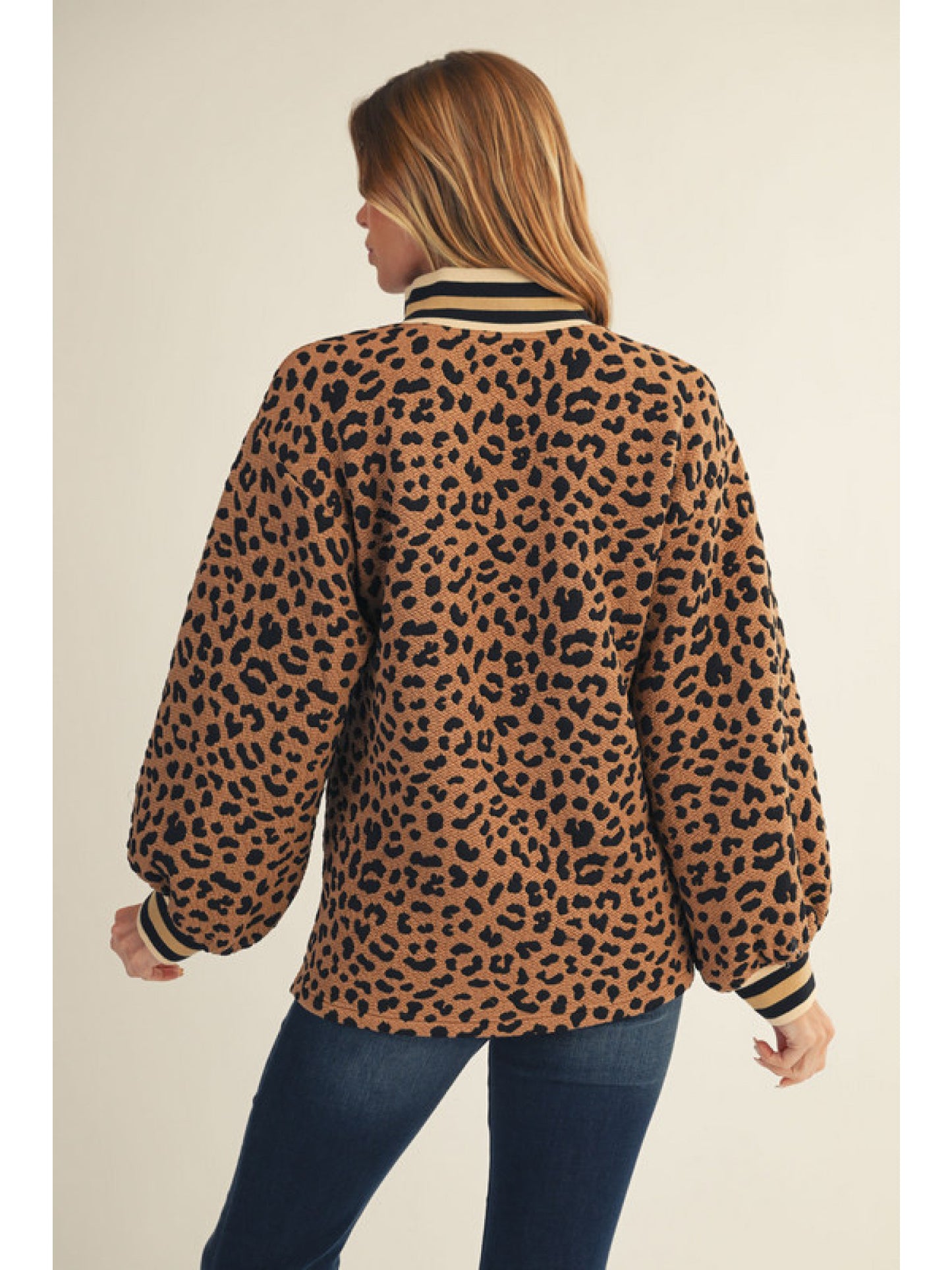 Toffee Long puff sleeves textured leopard top, v neck, stank-up collar, color rib band accent.