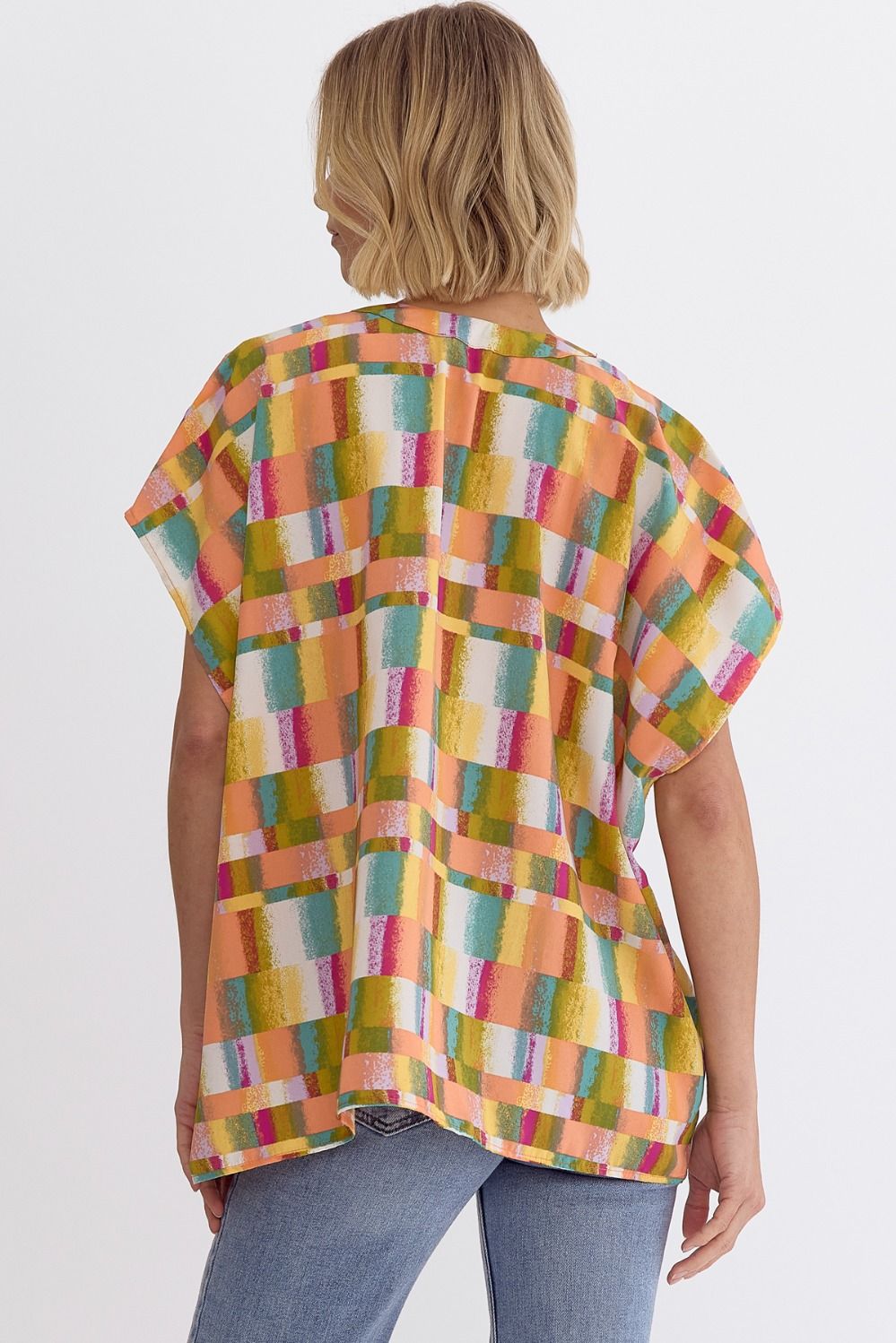 Checked print v-neck short sleeve top featuring drop shoulders