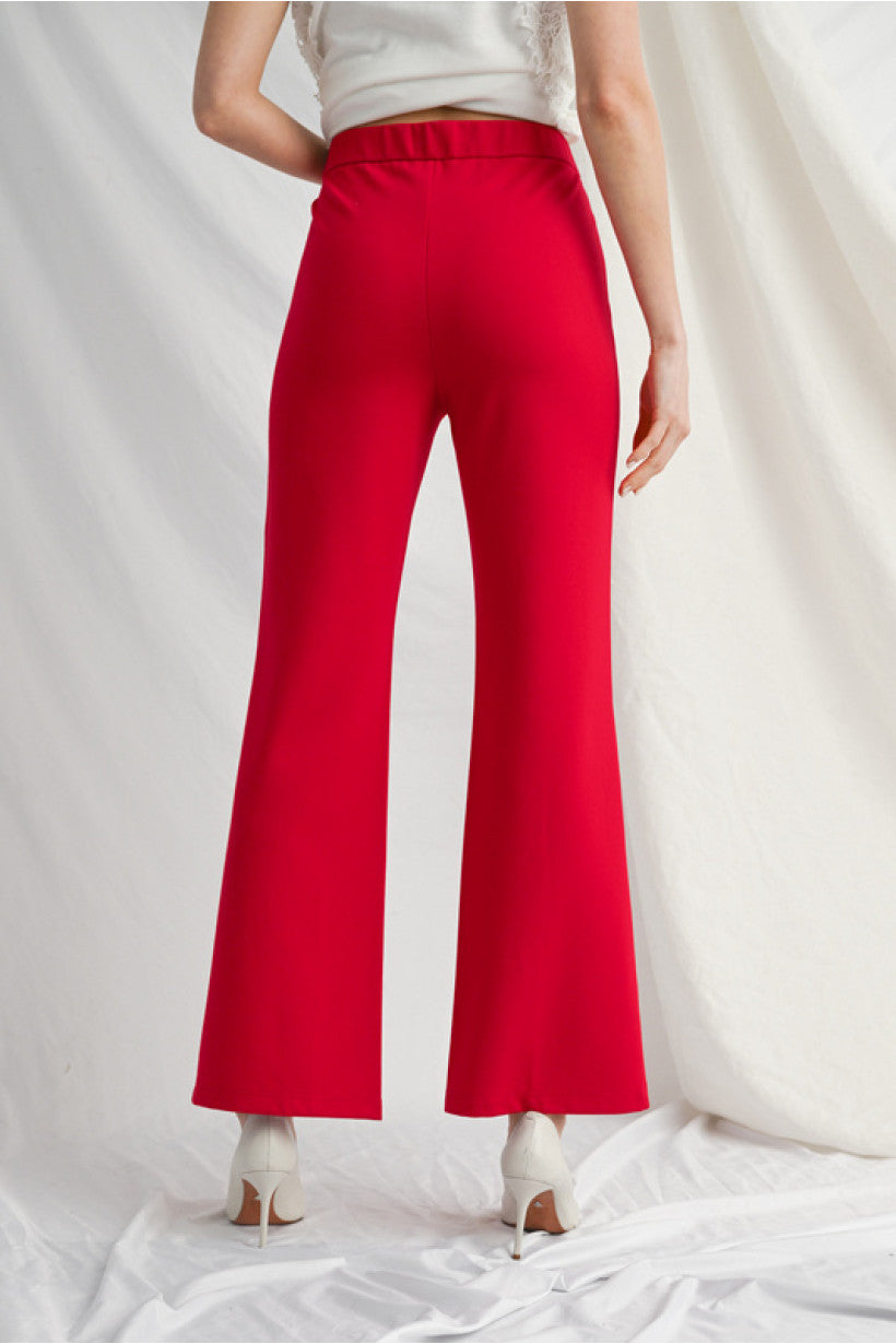 Red Solid bootcut slacks, one button closure, elastic waistband, slightly stretchable, side pockets.