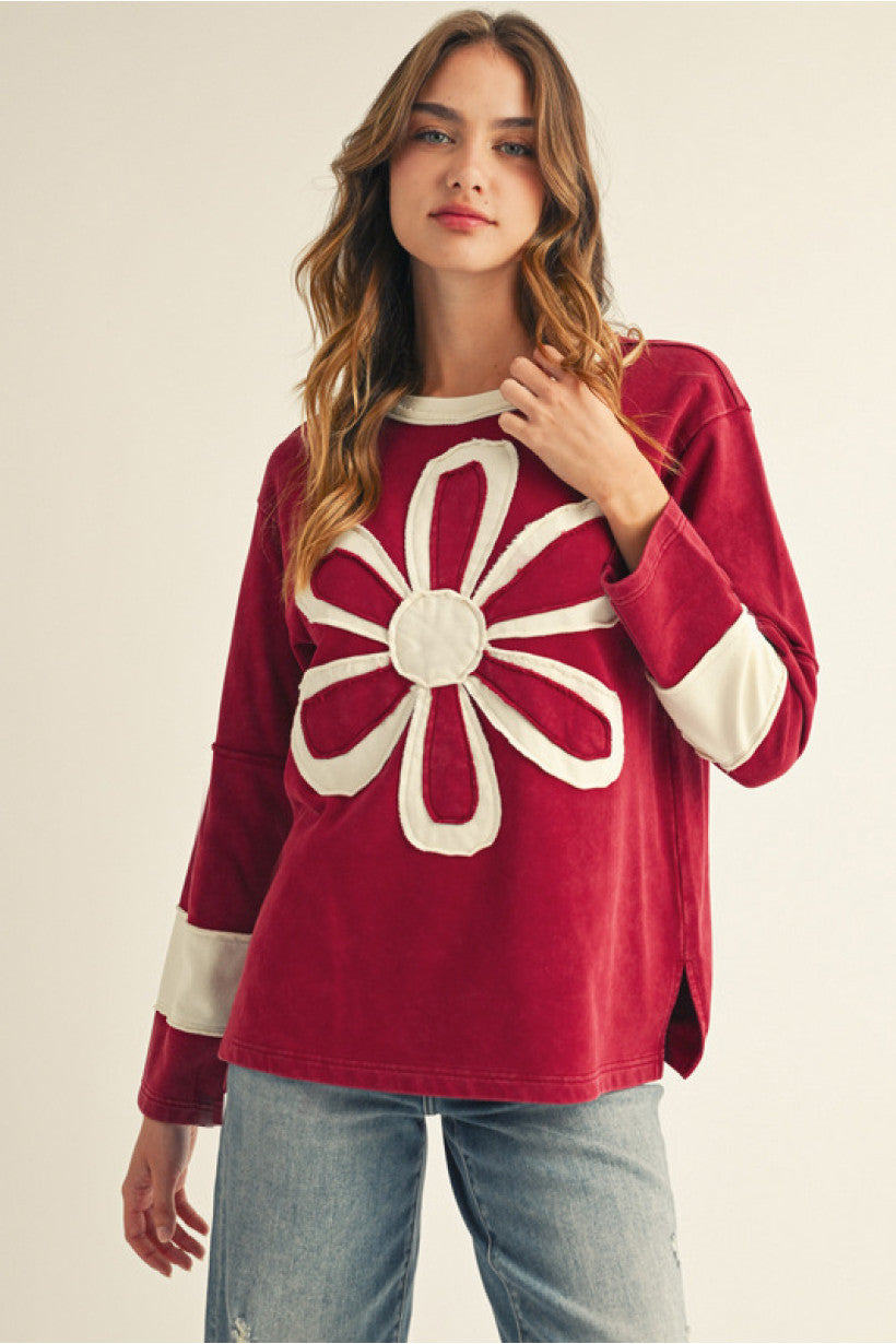 Burgundy Long sleeves color block top with big floral patch, raw cut edge accent.
