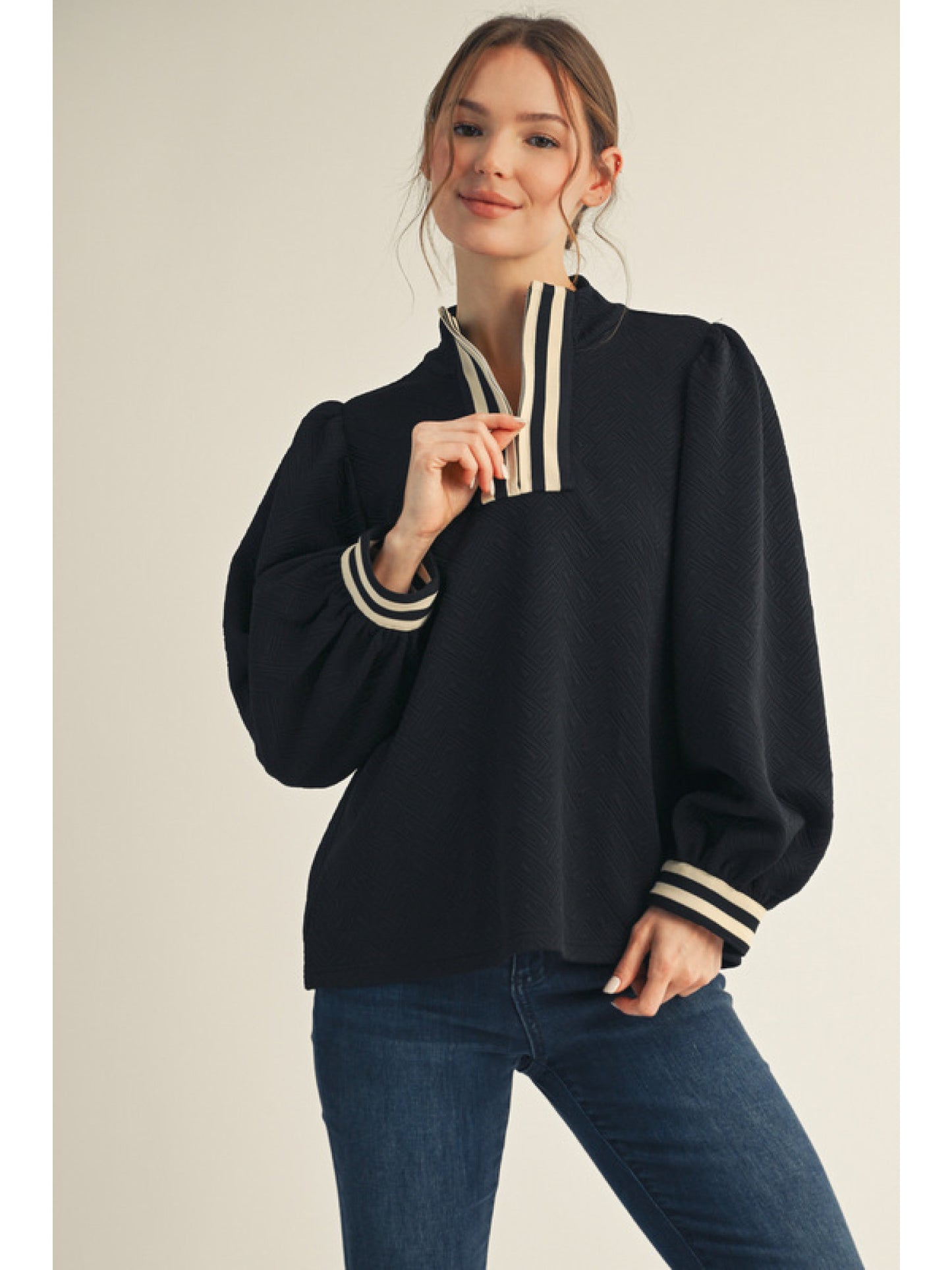 Black Long puff sleeves textured fabric solid top with front zip up, stripe contrast detail, mock neck.