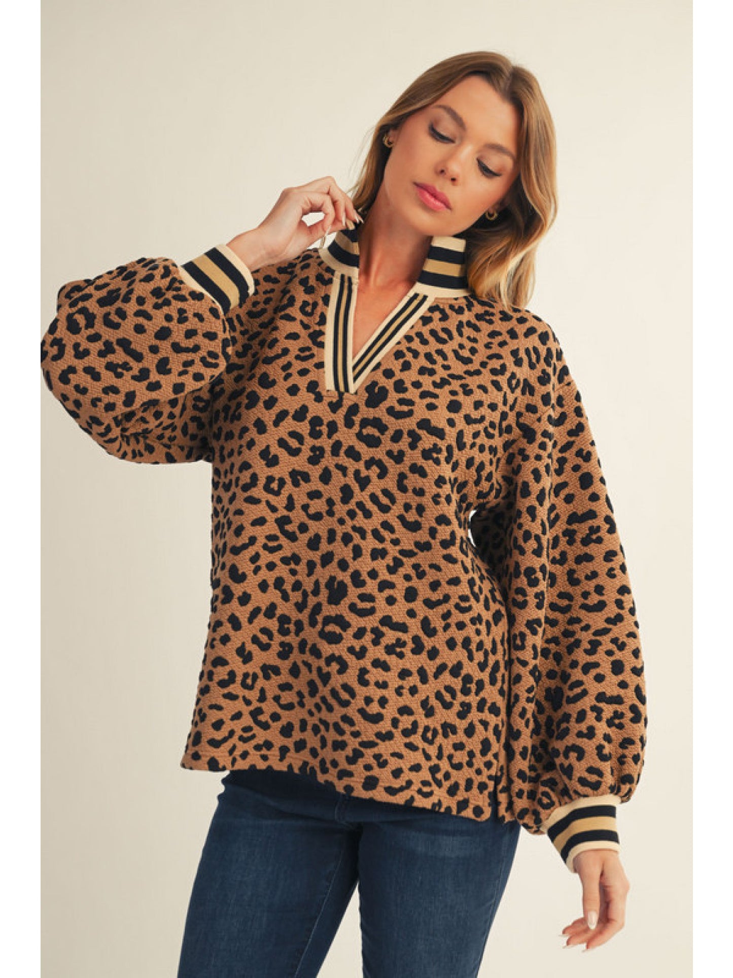 Toffee Long puff sleeves textured leopard top, v neck, stank-up collar, color rib band accent.