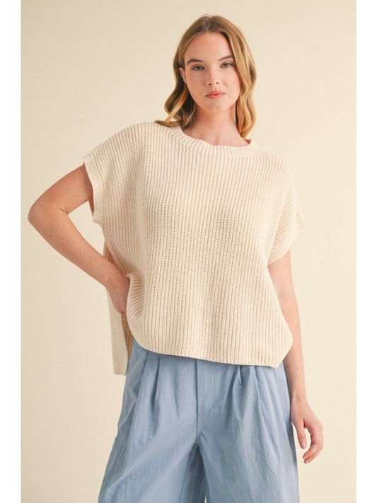 Oatmeal Textured knit top with mock neck, short kimono sleeves, and side slit detail.