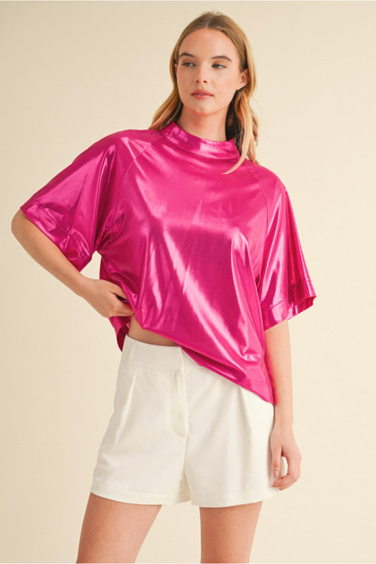 Hot Pink Glossy fabric top with mock neck, back key hole, half wide sleeves, and vented hemline.