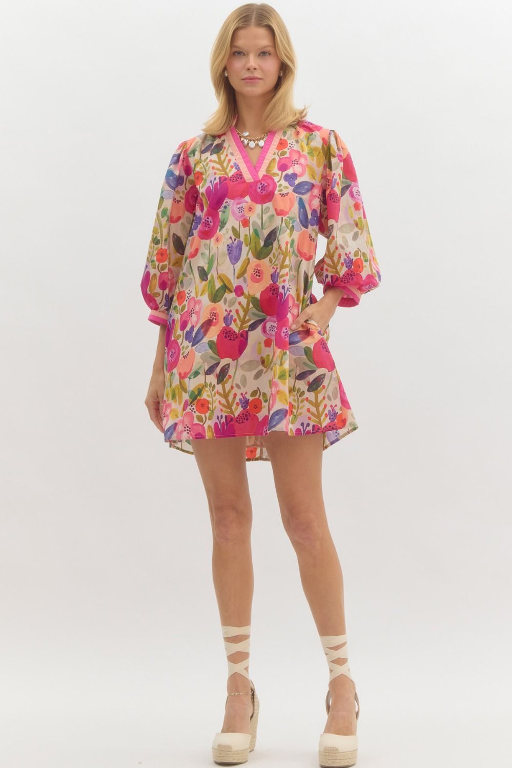Berry Floral print ¾ bubble sleeve pullover mini dress featuring 2-tone necka nd sleeve band. Pockets at side.