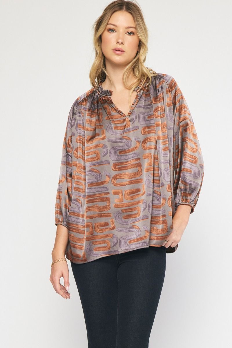 Toffee printed v-neck 3/4 sleeve top featuring ruffle