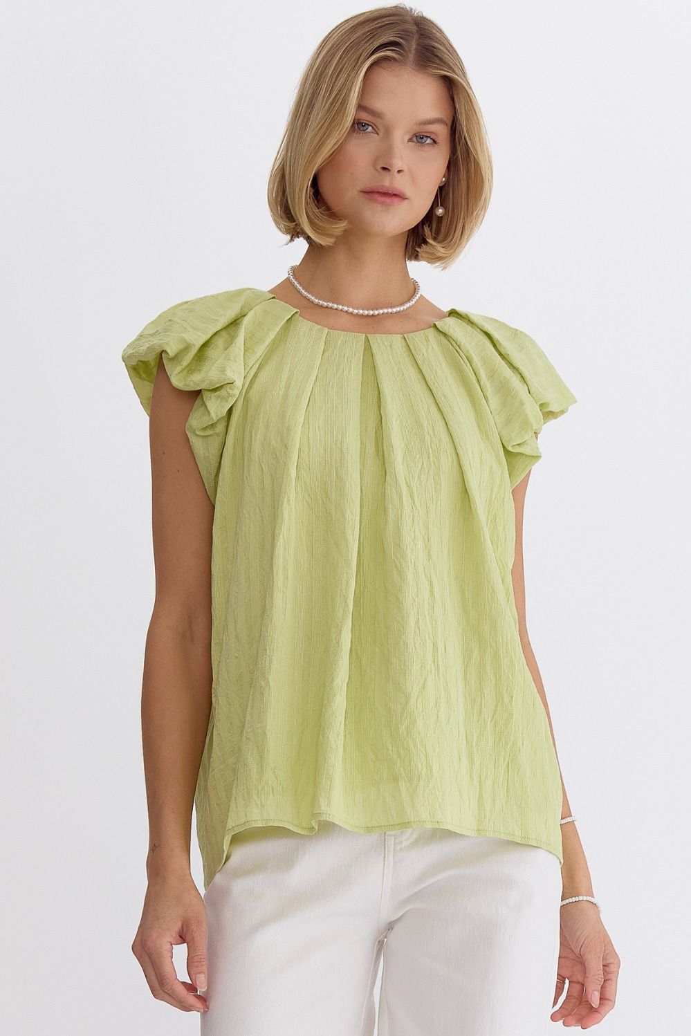 Honeydrew textured round neck short sleeve top featuring pleats