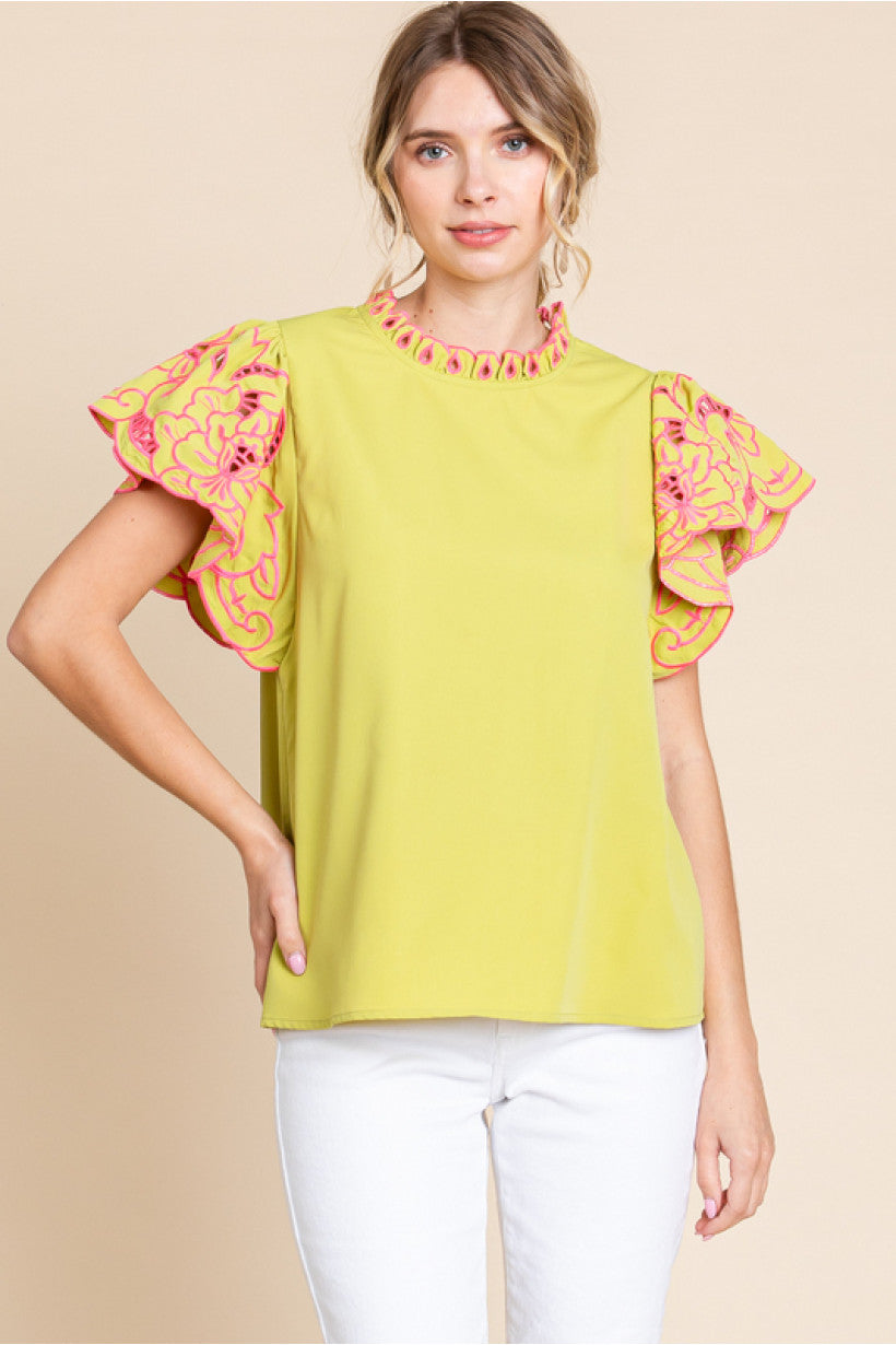 Kiwi Solid top with frilled neck