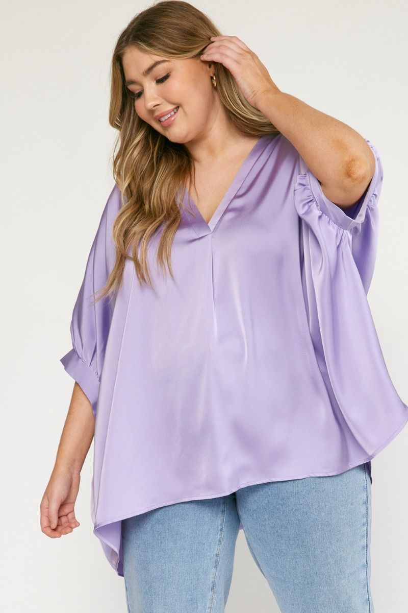 Lavender Satin v-neck 1/2 sleeve top featuring front placket detail